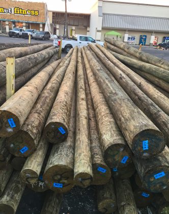 Poles staged for use in power restoration efforts due to Hurricane Michael