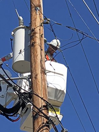 Gulf Power crews replacing poles as part of restoration efforts after Hurricane Michael